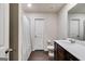 Bathroom featuring a modern vanity, mirror, and a shower with a curtain at 1018 Nandina Ct, Villa Rica, GA 30180