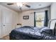 Bedroom featuring cozy carpet, ceiling fan, and natural light at 1018 Nandina Ct, Villa Rica, GA 30180