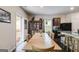 Inviting dining room with an adjacent kitchen area perfect for Gathering meals and gatherings at 1018 Nandina Ct, Villa Rica, GA 30180