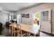 Light and airy dining room area with an adjacent living room at 1018 Nandina Ct, Villa Rica, GA 30180