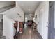 Inviting entryway with wood flooring, staircase, and view into the living room at 1018 Nandina Ct, Villa Rica, GA 30180