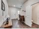 Foyer with wood floors, a staircase, and access to a half bathroom at 1018 Nandina Ct, Villa Rica, GA 30180