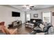 Comfortable living room with plush sofas, wood-look floors, and plenty of space at 1018 Nandina Ct, Villa Rica, GA 30180