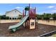 Spacious community playground with slide, swing set and climbing structure at 1018 Nandina Ct, Villa Rica, GA 30180