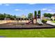 Community playground featuring swings, a slide, and climbing equipment at 1018 Nandina Ct, Villa Rica, GA 30180