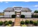 Community pool entrance with stairs, fencing, and well-maintained landscaping at 1018 Nandina Ct, Villa Rica, GA 30180