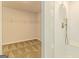 Bathroom featuring a glass-enclosed shower with a bench and a large walk-in closet for storage at 189 Orwell Dr # 47, Social Circle, GA 30025