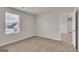 Bedroom featuring neutral carpeting and a window providing natural light at 271 Orwell Dr # 49, Social Circle, GA 30025
