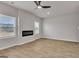 This spacious living room includes a modern fireplace and plenty of natural light at 271 Orwell Dr # 49, Social Circle, GA 30025