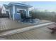 Cozy back deck with outdoor seating, perfect for entertaining or enjoying a relaxing evening outdoors at 25 Franklin Way, Covington, GA 30016