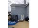 Outdoor patio area with view of backyard and blue siding. Trampoline and kiddie pool shown at 25 Franklin Way, Covington, GA 30016