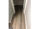 Bathroom entryway with light hardwood flooring at 25 Franklin Way, Covington, GA 30016