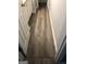 Bathroom entryway with light hardwood flooring at 25 Franklin Way, Covington, GA 30016