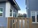 View of deck with house and view of a small trampoline on the lawn at 25 Franklin Way, Covington, GA 30016