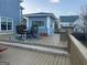 View of the wooden deck with a table, chairs, and a small gazebo at 25 Franklin Way, Covington, GA 30016