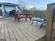 Exterior deck area with an outdoor picnic table and a lounge chair at 25 Franklin Way, Covington, GA 30016