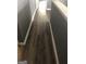 Hallway with gray walls and light hardwood flooring at 25 Franklin Way, Covington, GA 30016