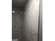 Bathroom shower with marbled subway tiling at 25 Franklin Way, Covington, GA 30016