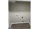 Laundry closet with hookups and vinyl flooring at 2961 Forelock Sw Pl, Marietta, GA 30064