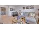 Bright bonus room with neutral decor, sofa and stylish coffee table at 1678 Lacebark Elm Way, Lawrenceville, GA 30045