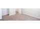 Carpeted bedroom features trim and neutral walls at 6671 Pelica Ct, Riverdale, GA 30274