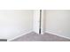This bedroom offers neutral walls and carpet at 6671 Pelica Ct, Riverdale, GA 30274