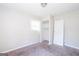 Bedroom featuring window and closet at 6671 Pelica Ct, Riverdale, GA 30274