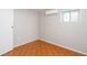 View of a room featuring neutral walls, tile flooring and a window AC unit at 6671 Pelica Ct, Riverdale, GA 30274