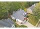 Bird's eye view of home with lush greenery and a well-manicured lawn at 3192 Creek W Trce, Powder Springs, GA 30127