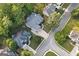 Aerial view of a charming home with a well-manicured lawn in a leafy suburban setting at 3192 Creek W Trce, Powder Springs, GA 30127