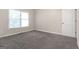 Carpeted bedroom with natural light at 3192 Creek W Trce, Powder Springs, GA 30127