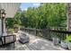 Spacious deck with wooded views, perfect for outdoor relaxation at 3946 Paces Ferry Nw Rd, Atlanta, GA 30327