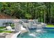 Relaxing pool and spa with fire features and tranquil setting at 3946 Paces Ferry Nw Rd, Atlanta, GA 30327