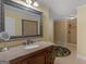 Bathroom with granite vanity and walk-in shower at 2554 Emerald Dr, Jonesboro, GA 30236