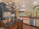 Modern kitchen features a large island, copper farm sink, and high-end appliances at 2554 Emerald Dr, Jonesboro, GA 30236