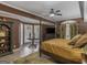 Spacious main bedroom with a four-poster bed and bay window at 2554 Emerald Dr, Jonesboro, GA 30236