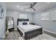 Comfortable bedroom with a queen-size bed, wood flooring, and plenty of natural light at 749 Casplan Sw St, Atlanta, GA 30310