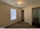 Bedroom with carpet floors and a window with blinds at 5425 Twin Lakes Dr, Atlanta, GA 30349