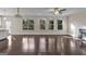 Open living space with hardwood floors, large windows, and fireplace at 2632 Oakdale Nw St, Atlanta, GA 30318