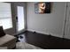 Living room with dark hardwood floors and a door leading outside at 2632 Oakdale Nw St, Atlanta, GA 30318