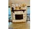 Stone fireplace with decorative mantel and hearth at 3515 Sheree Trl, Stone Mountain, GA 30087