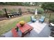 Lawn and patio features outdoor seating, flowers, retaining wall, and a garden at 121 Pinnacle Ln, Mcdonough, GA 30253