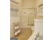 Bright bathroom featuring a glass enclosed shower and ample storage at 121 Pinnacle Ln, Mcdonough, GA 30253