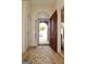 Inviting entryway with decorative rug and arched doorway at 121 Pinnacle Ln, Mcdonough, GA 30253