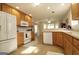 Bright kitchen with white appliances and ample counter space at 121 Pinnacle Ln, Mcdonough, GA 30253