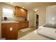 Well-lit kitchen featuring wood cabinets and modern appliances at 121 Pinnacle Ln, Mcdonough, GA 30253