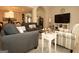 Comfortable living room setup with modern furnishings and ample natural light at 121 Pinnacle Ln, Mcdonough, GA 30253
