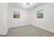 Bright bedroom with neutral walls and carpeting at 1008 King Rd, Riverdale, GA 30296