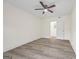 Bedroom with wood-look floors and door to bathroom at 1008 King Rd, Riverdale, GA 30296