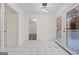 Bright dining area with tile floors and access to a deck at 1008 King Rd, Riverdale, GA 30296